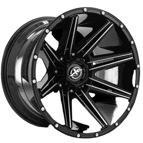 Black alloy wheel with a brand logo on a white background