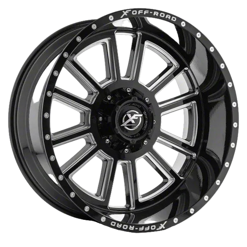 Black off-road wheel with metallic finish on a white background